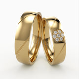 Vielsesringe i Guld med Blomsterformet Diamant Design