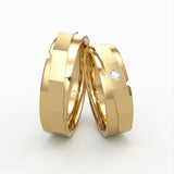 Facetslebne guld vielsesringe med diamant – EG34