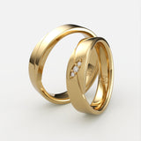Guld vielsesringe med facetslibning og tre diamanter – EG35 - sider