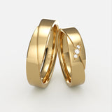 Guld vielsesringe med skråsnit og tre diamanter – EG35