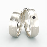 Hvidgulds vielsesringe med bølget design og sorte og hvide diamanter – EG42