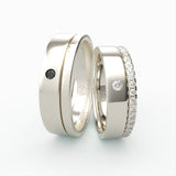 Hvidgulds vielsesringe med sort solitaire og fuld diamantkant – EG32