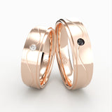 Rosaguld vielsesringe med bølget design og sorte og hvide diamanter – EG42