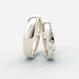 Vielsesringe i hvidguld med bølgeslebne og graduerede diamanter – EG09