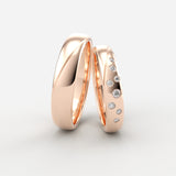 Rosaguld vielsesringe med bølgeslebne og graduerede diamanter – EG09