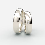 Hvidgulds vielsesringe med bølget gravering og 3 diamanter – EG12