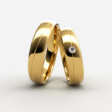 Guld vielsesringe med midterrille og solitær diamant – EG13