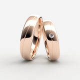 Rosaguld vielsesringe med centerrille og solitaire diamant – EG13