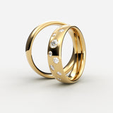 Guld vielsesringe med ujævnt placerede diamanter i stjernespredning – EG17