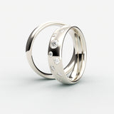 Vielsesringe i hvidguld med ujævnt placerede diamanter i et stjernemønster – EG17