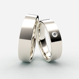 Vielsesringe i hvidguld med flad profil og besat diamant – EG30