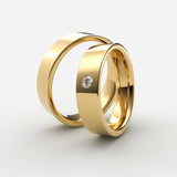 vielsesringe i guld med flad profil og indfattet diamant – EG30