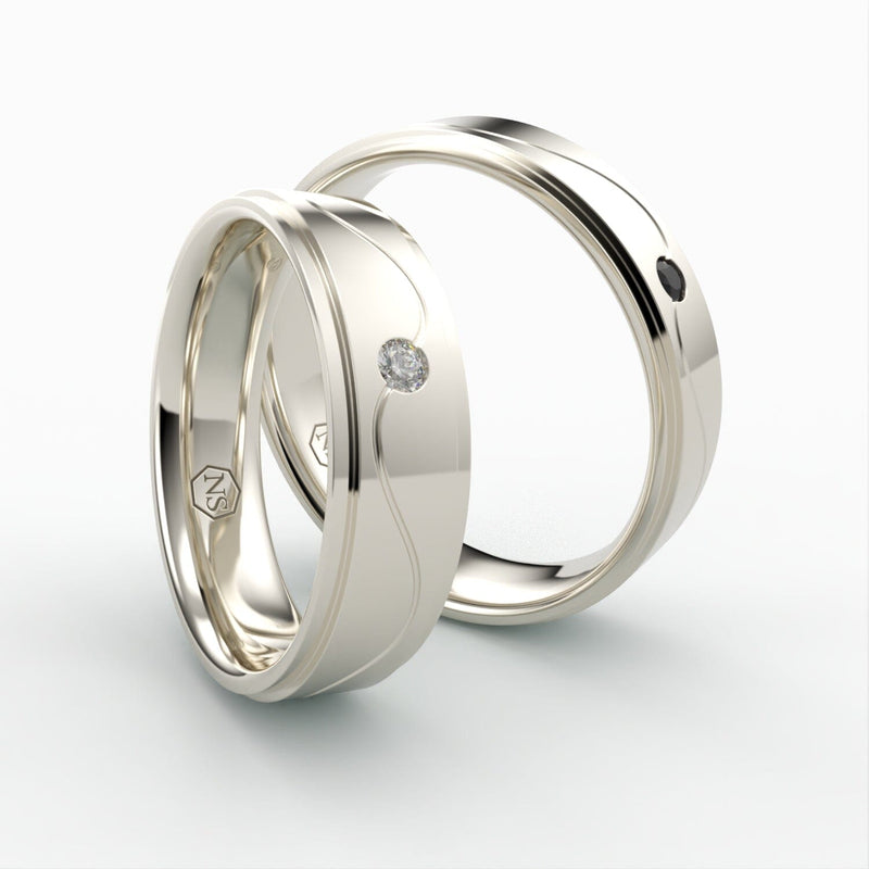 Hvidgulds vielsesringe med bølget design og sorte og hvide diamanter – EG42 - side